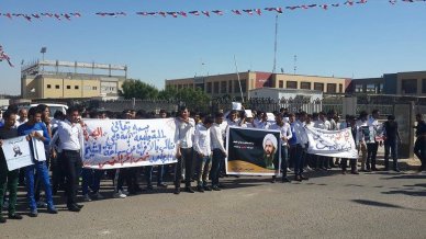 مسيرة تضامنية لطلبة جامعة البصرة ضد قرار حكم لاعدام بحق العلامة النمر