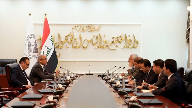 A government meeting to support the dinar and address manipulation and speculation